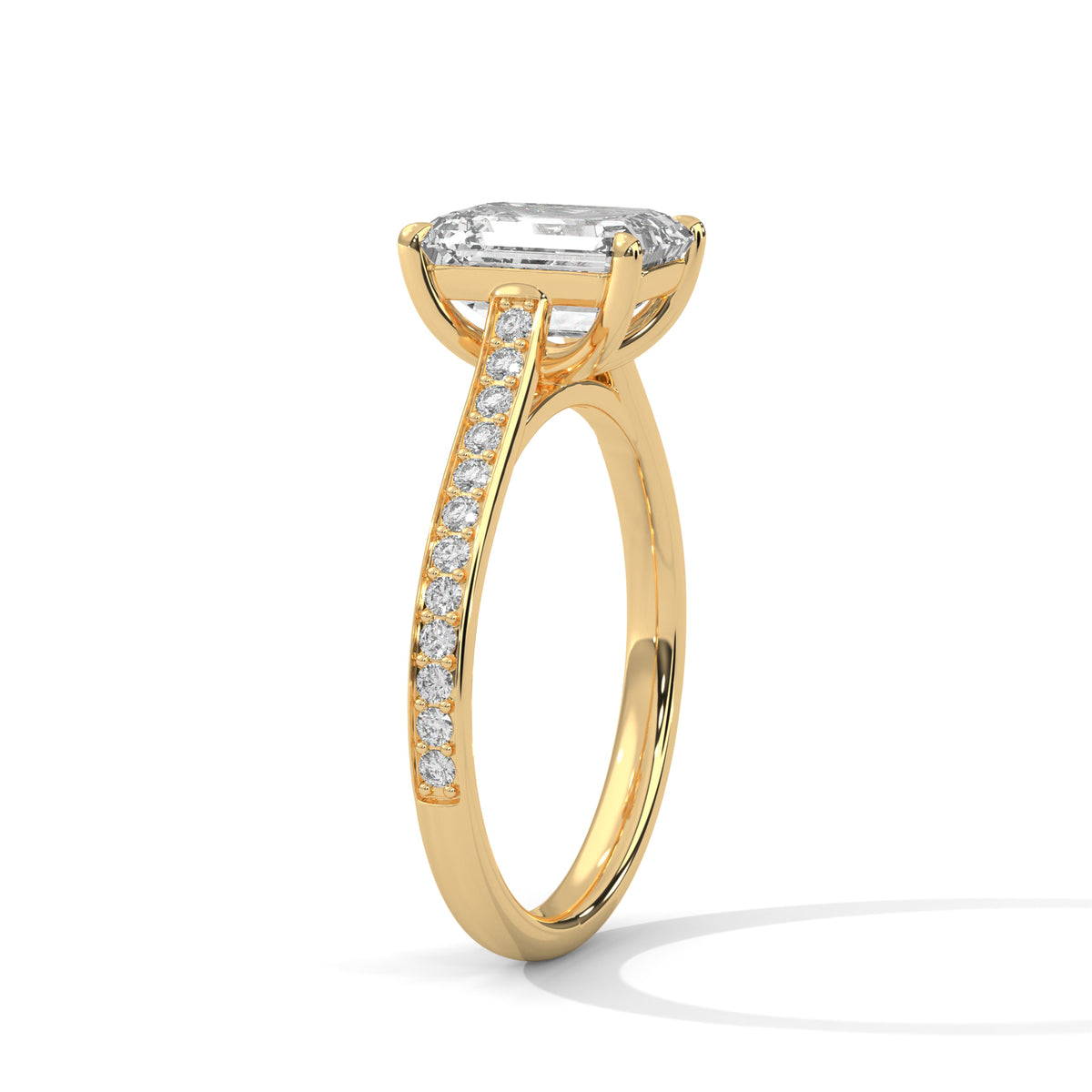 Elevated Emerald Solitaire Ring