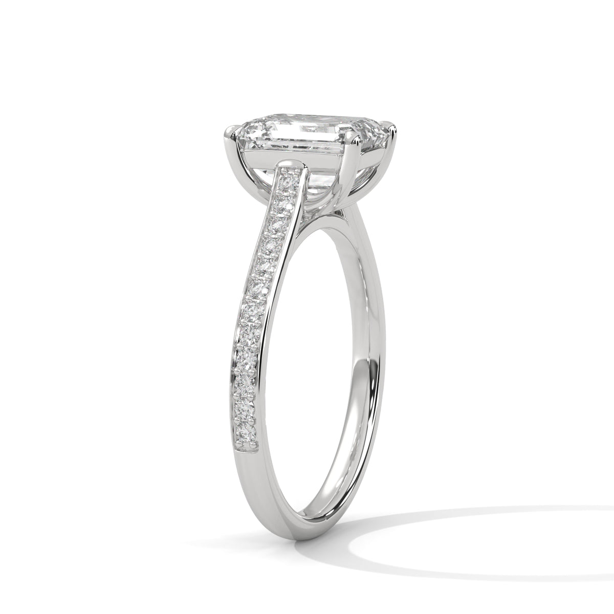 Elevated Emerald Solitaire Ring