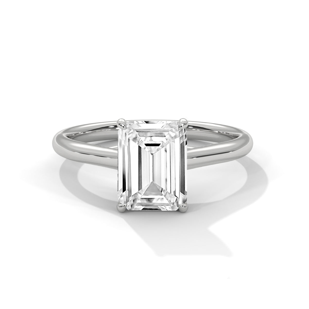 Pure Clarity Emerald Solitaire Ring