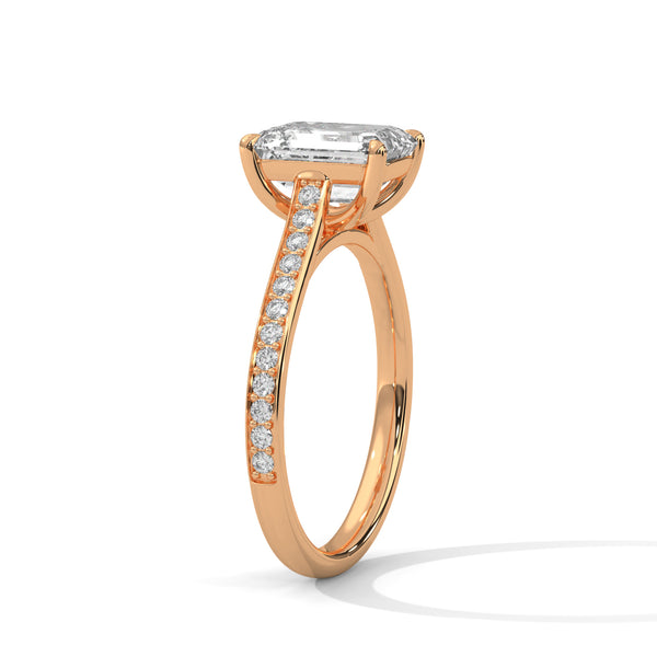 Elevated Emerald Solitaire Ring