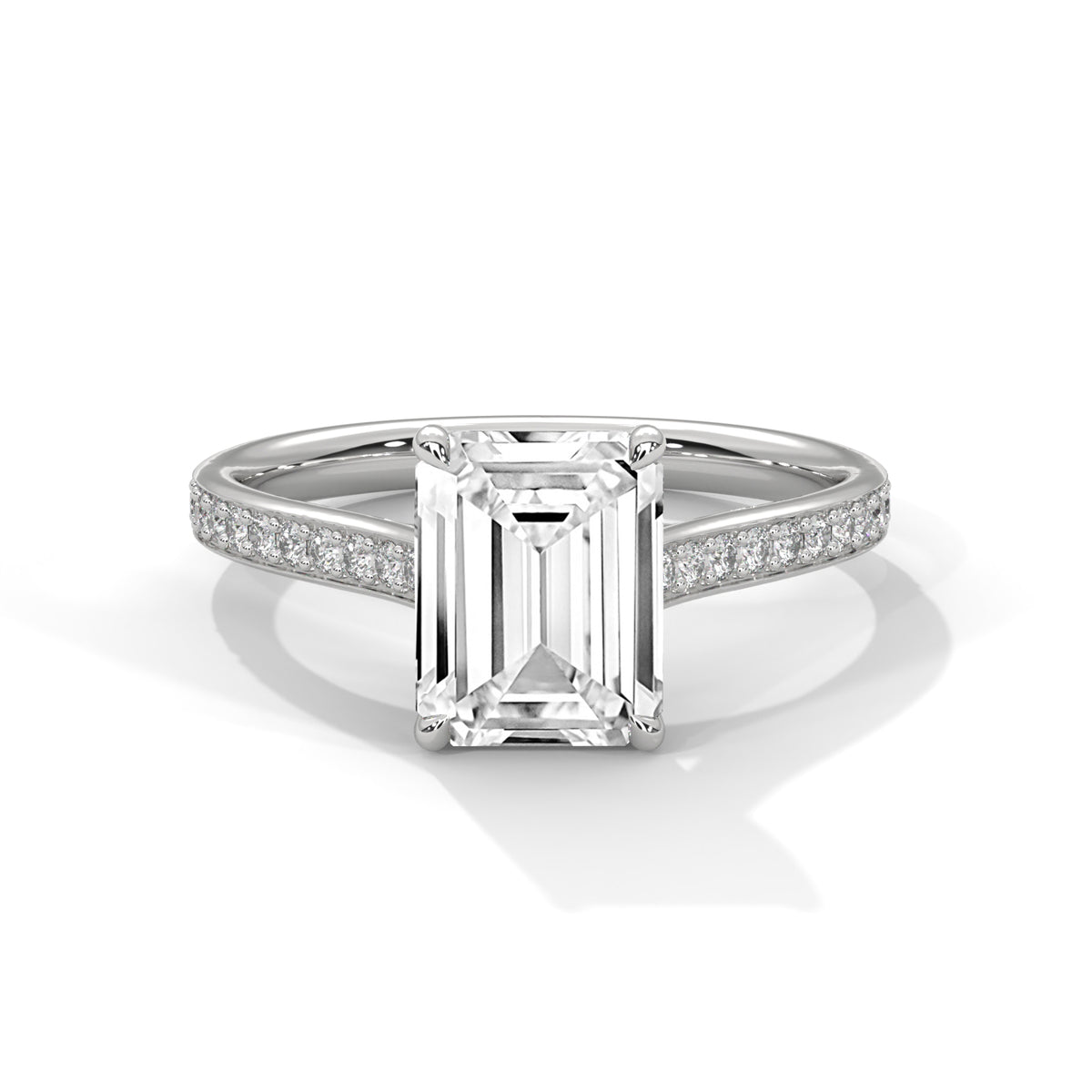 Elevated Emerald Solitaire Ring