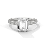 Elevated Emerald Solitaire Ring